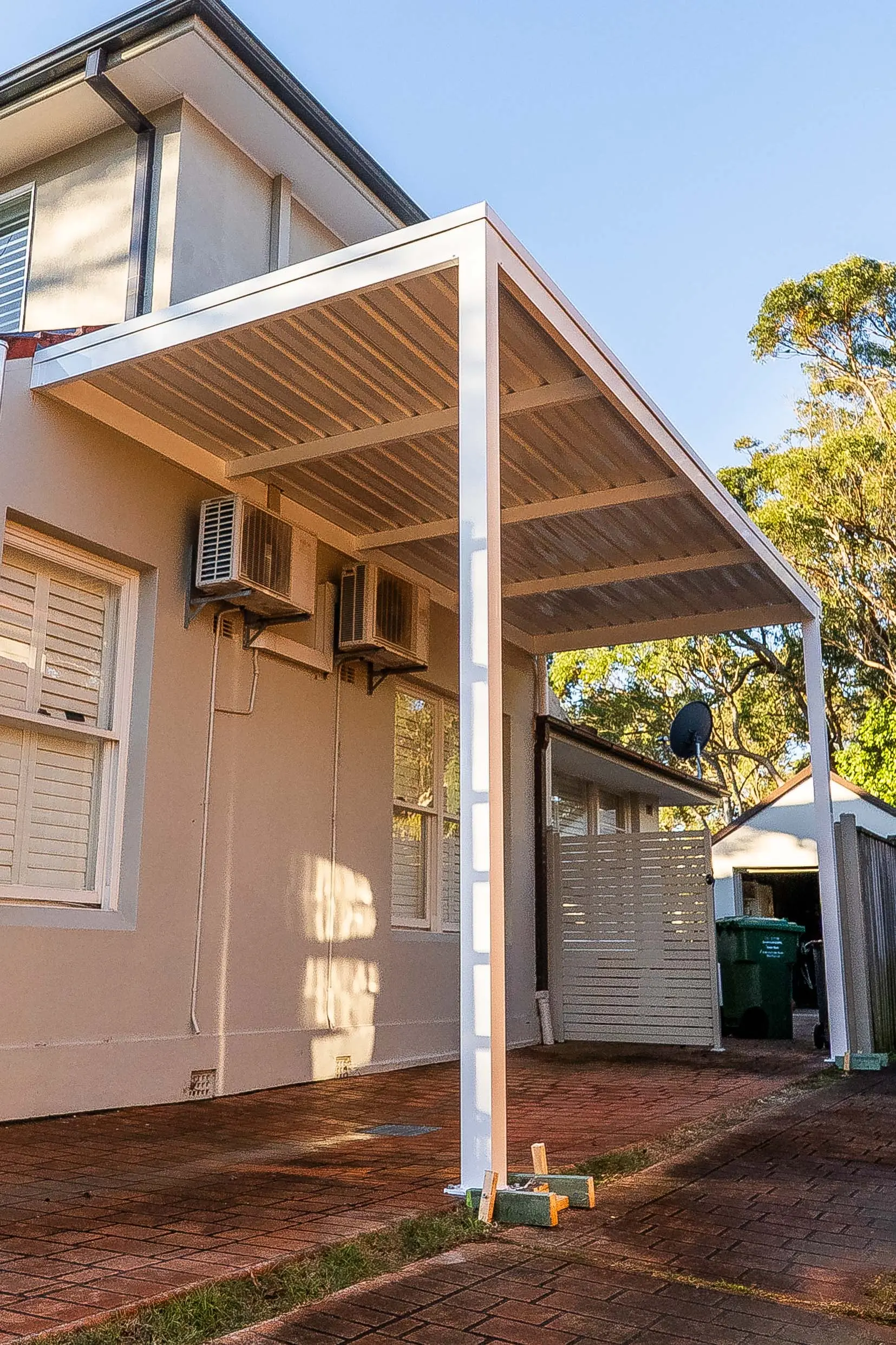 Detail of post-to-beam junction on the custom carport frame