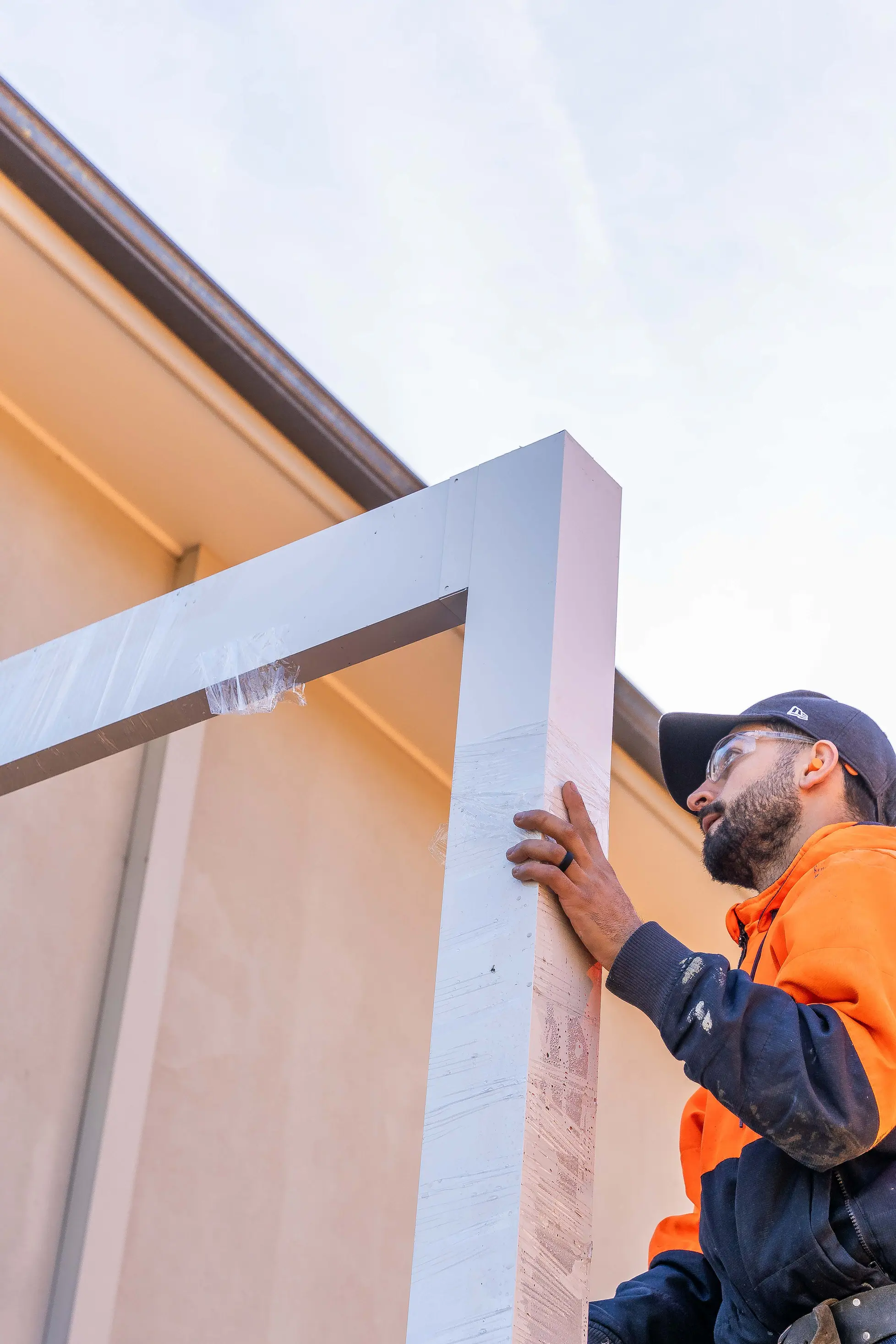 Clearance under the roof over existing wall-mounted equipment