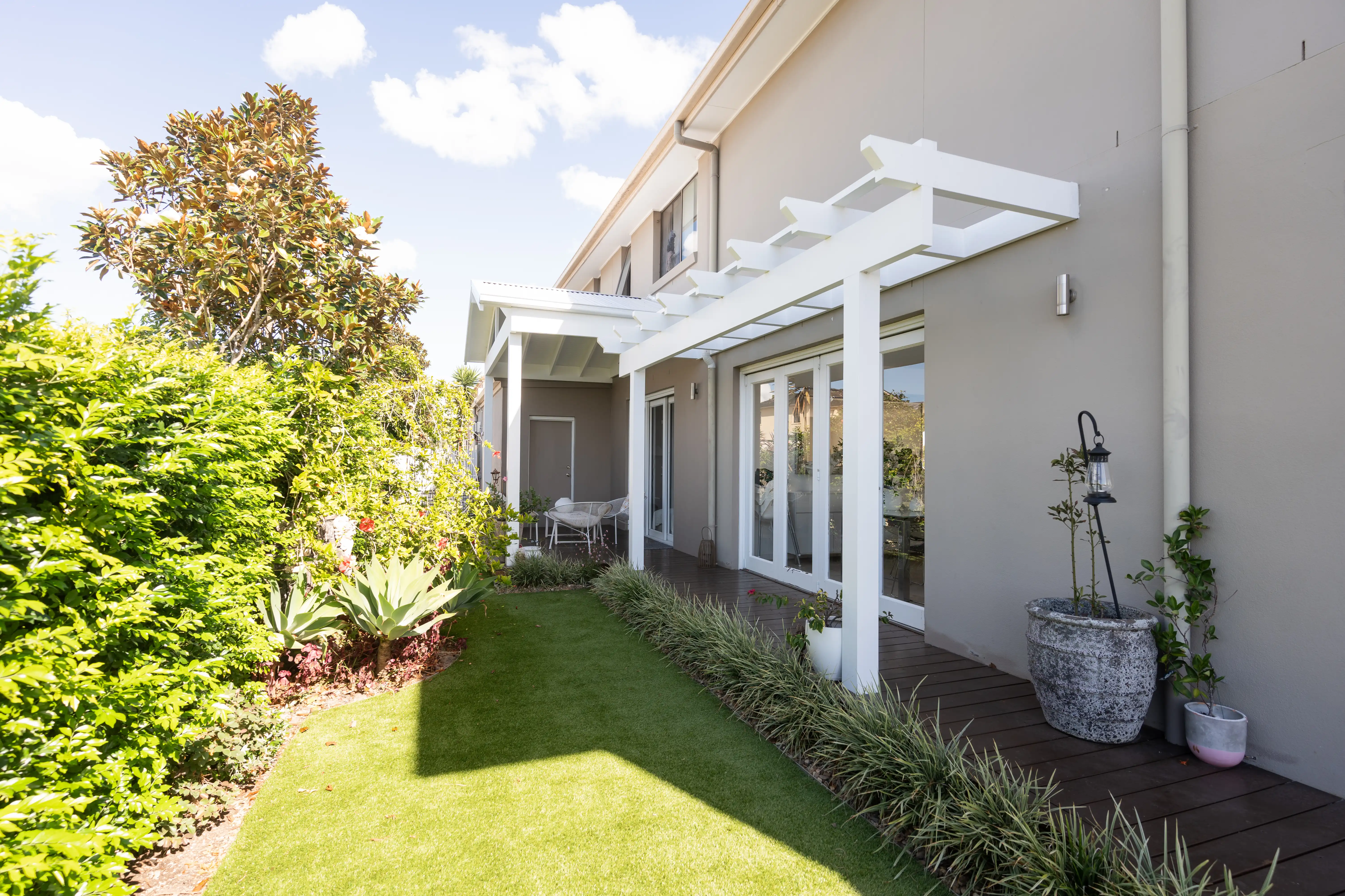 Custom timber pergola with open-slat roof