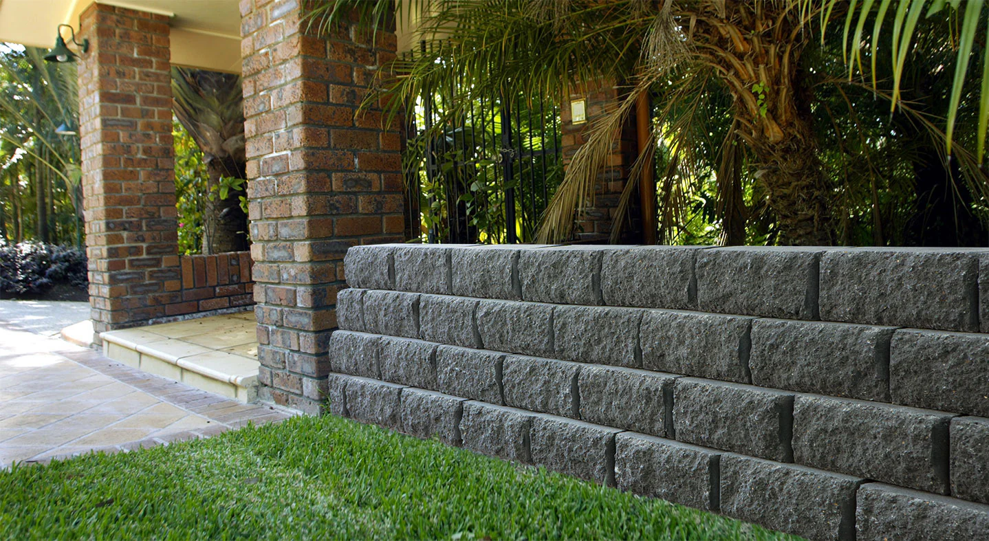 Rendered brick retaining wall contemporary finish